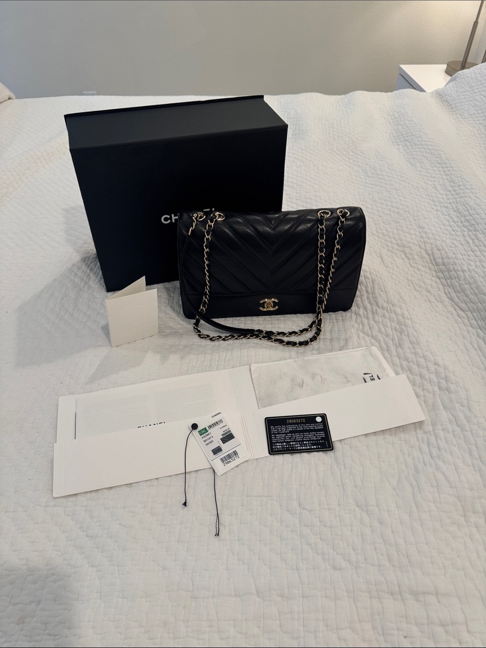 CHANEL Black Chevron Quilted Shoulder Bag with Gold Chain